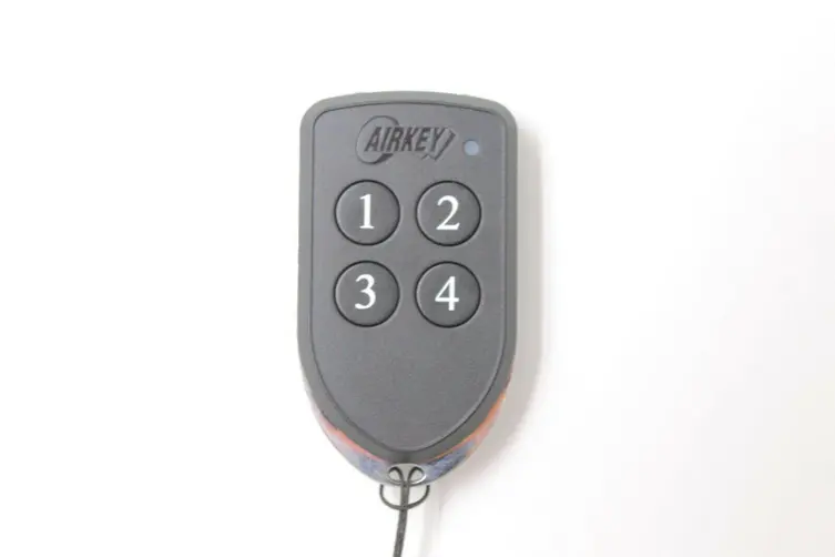 AIRKEY SERIES-4, 4 BUTTON REMOTE 30-BIT WIEGAND TRANSMITTER 433.92MHZ IP65 BLACK WITH SILVER TRIM WITH BLACK KEYS 1/2/3/4 ROLLING CODE ENCRYPTION